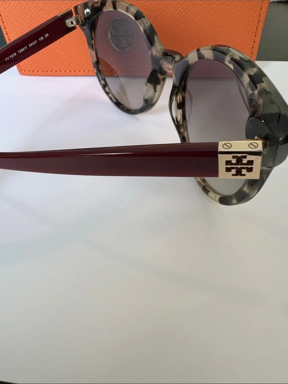 Tory Burch sunglasses.